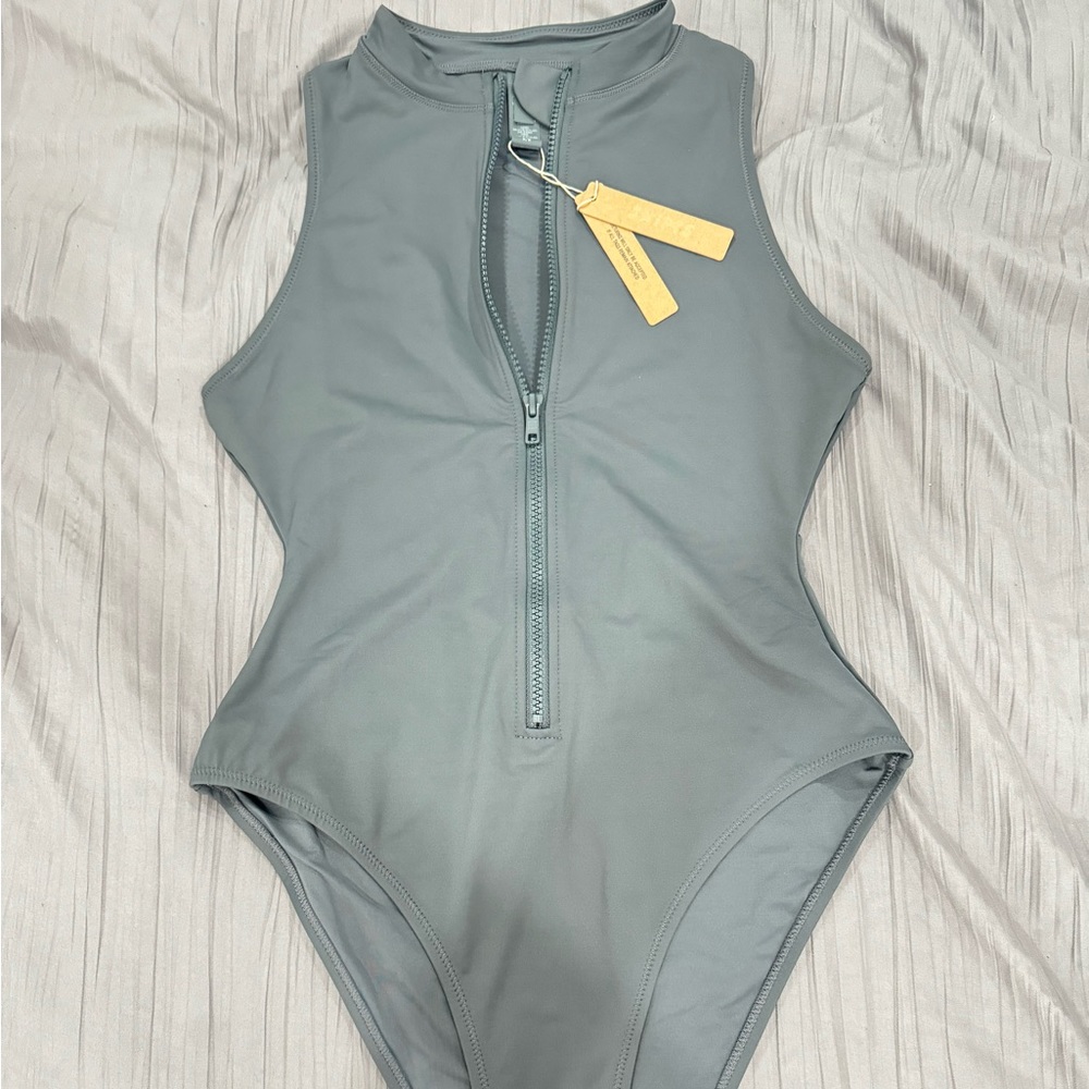 Skims front zip one piece sleeveless bathing suit